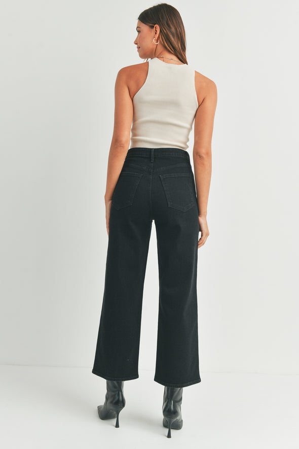 Black high-waisted jeans with wide-leg cargo pockets